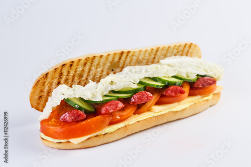 Papini with sausage on a white background.