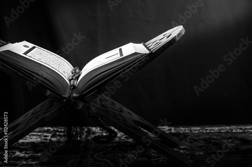 Koran - holy book of Muslims,ฺblack and white  style filtered photo