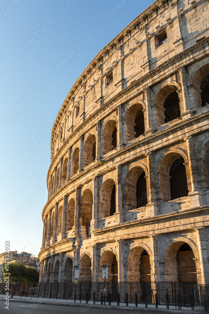 Colosseum with the beautiful sunset light, Rome, Italy.