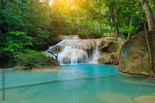 Erawan Waterfall, beautiful waterfall in deep forest, Erawan National Park in Kanchanaburi, Thailand © cakeio