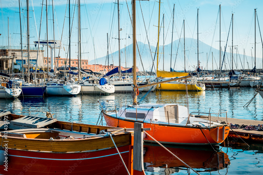Street view of Naples harbor with boats, italy Europe