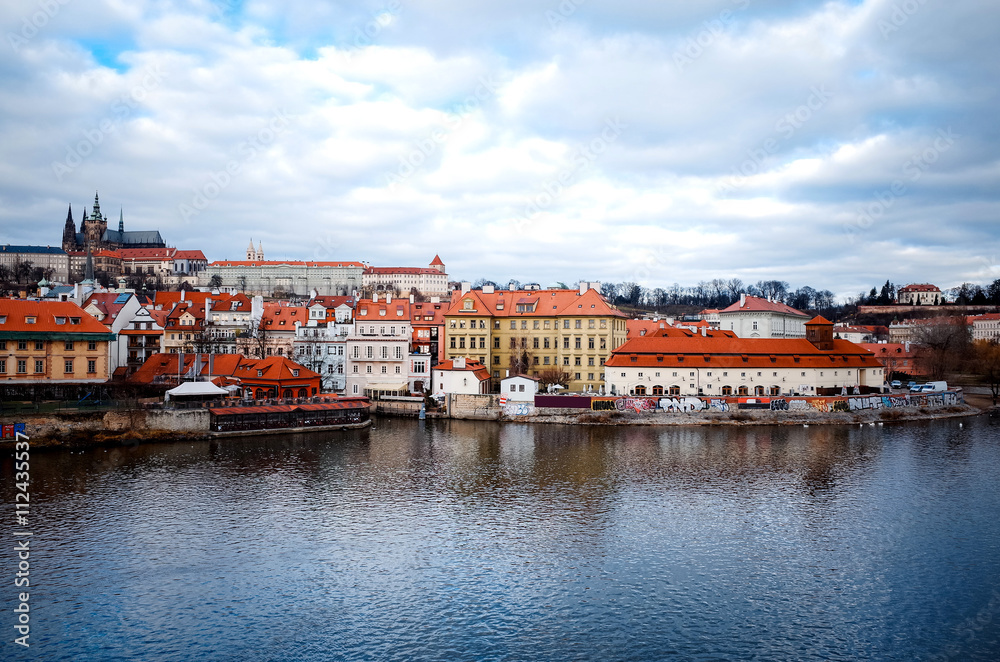 Fototapeta premium Old Town ancient architecture and river pier in Prague, Czech Re
