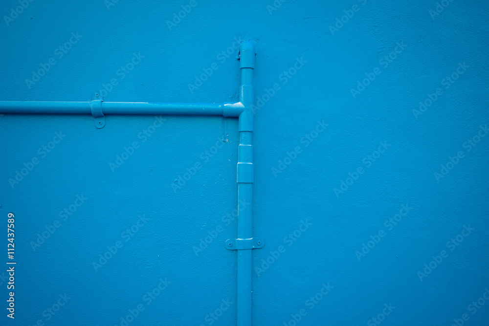 Minimalism style, Blue water tube on the wall. Minimalism style, Blue water tube on the wall.