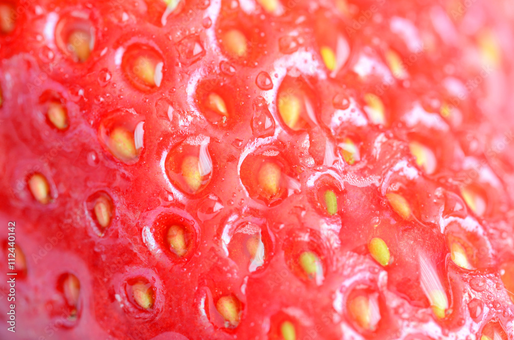 Macro of strawberry texture with yellow seeds Macro of strawberry texture with yellow seeds