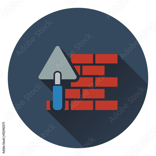 Icon of brick wall with trowel