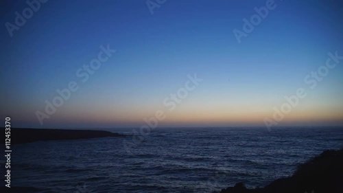 Timelapse of a majestic sunset at Spooners Cove photo