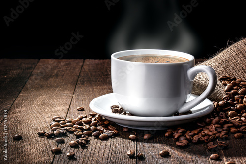 cup of coffee on a wooden photo
