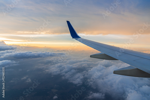 Wing aircraft at cloud sunset