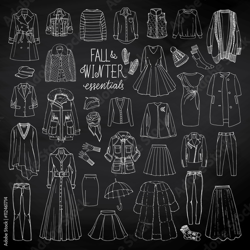 Vector illustration  fall and winter fashion collection of clothes on blackboard. Hand-drown objects sketch with coats, dresses, skirts, jacket, trousers, hats, gloves, socks. 
Black and white set.