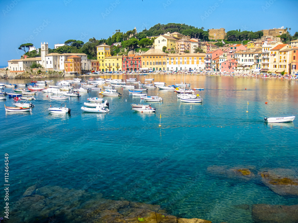 Aerial view of the spectacular and famous Bay of Silence with its boats and its lovely beach. Sestri Levante, Province of Genoa in Liguria, Italy.