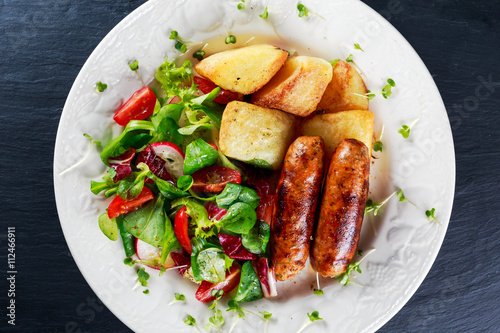 Roasted Sausages with Chips and Mix Vegetable salad