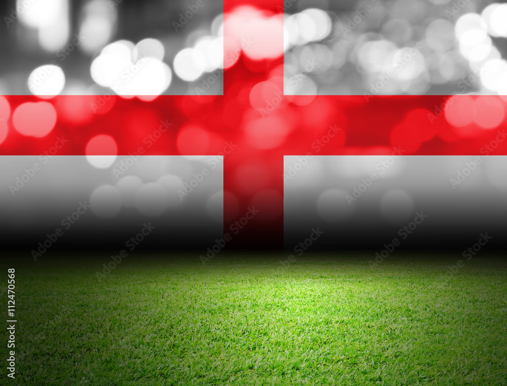 Naklejka premium Soccer field and bokeh with england flag