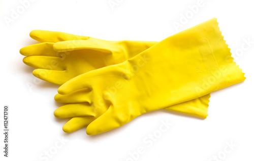Stock Photo:
Yellow rubber gloves for cleaning on white background, workhouse concept
