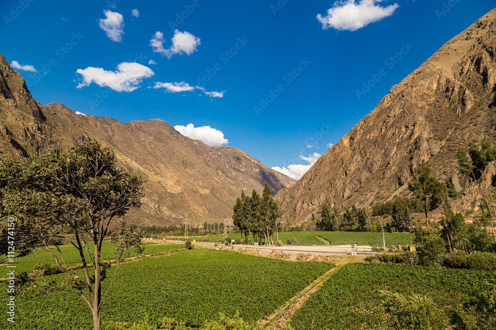 Fototapeta premium Sacred Valley moutains with green area, Cusco, Peru