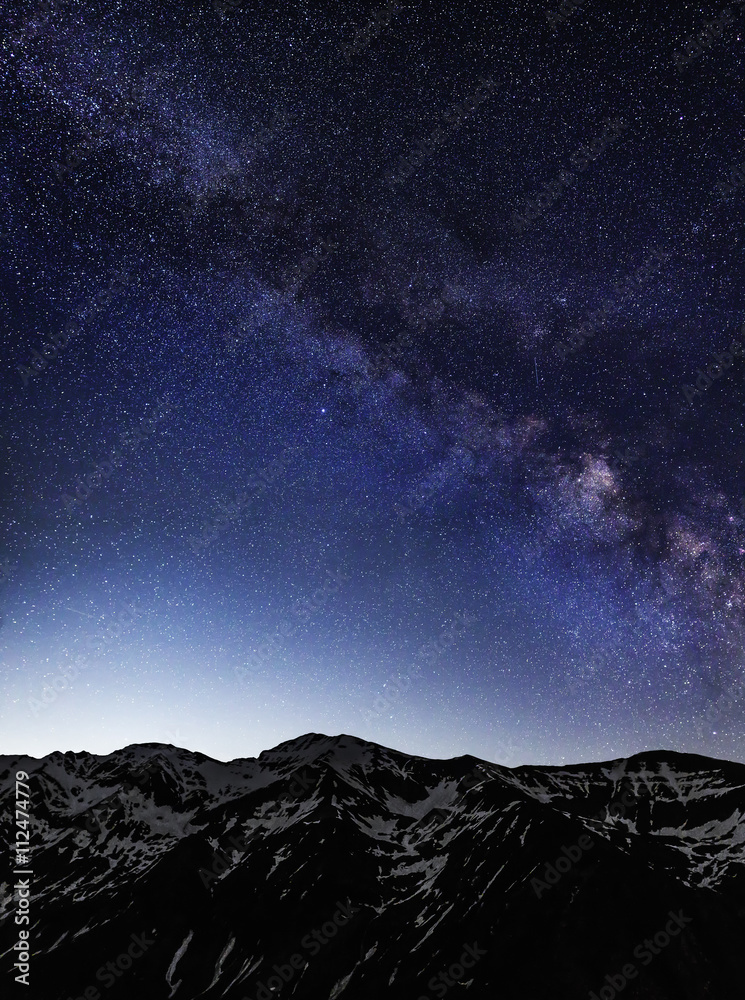 Milky Way galaxy over mountains