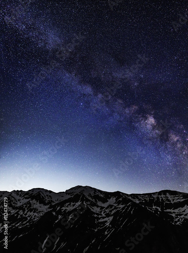 Milky Way galaxy over mountains