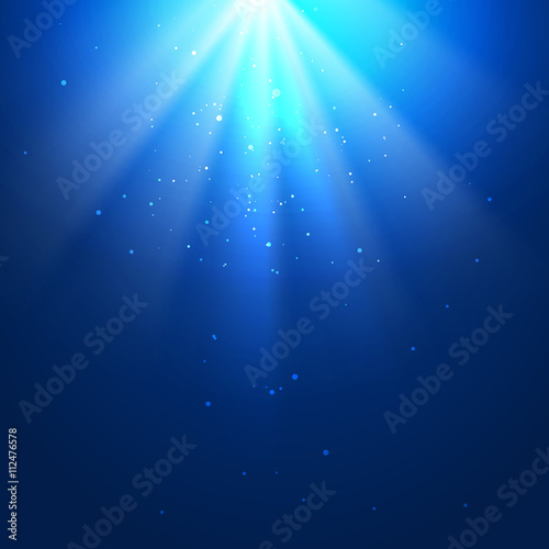 Underwater blue background with sun rays