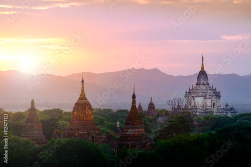 Colorful sunset landscape view with silhouettes of temples, Baga