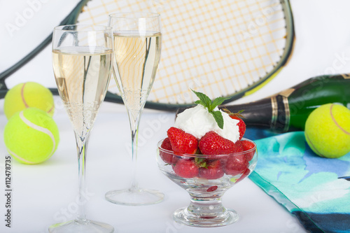 Strawberries with whipped cream and champagne on Wimbledon tennis tournament