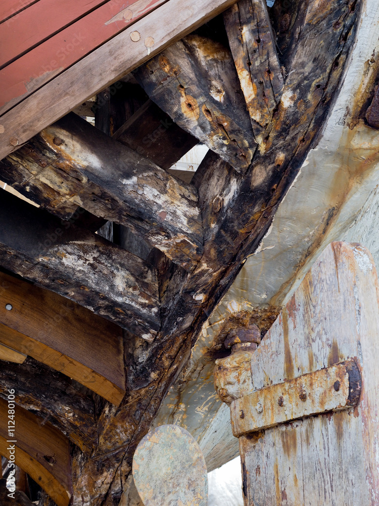 FAVERSHAM, KENT/UK - March 29 : Damaged woodwork on a decaying b FAVERSHAM, KENT/UK - March 29 : Damaged woodwork on a decaying b