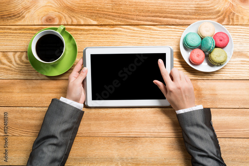 Businesswoman having coffee break photo