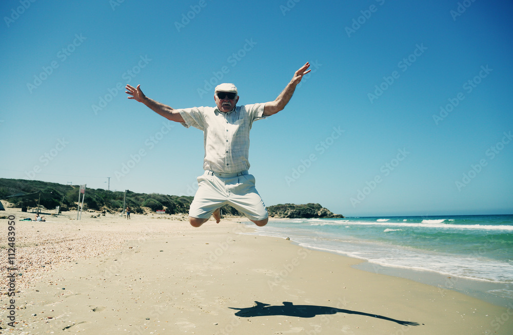 Portrait of senior man on the beach