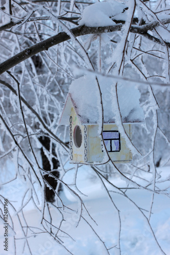 Feeding trough for birds in the winter - a small house