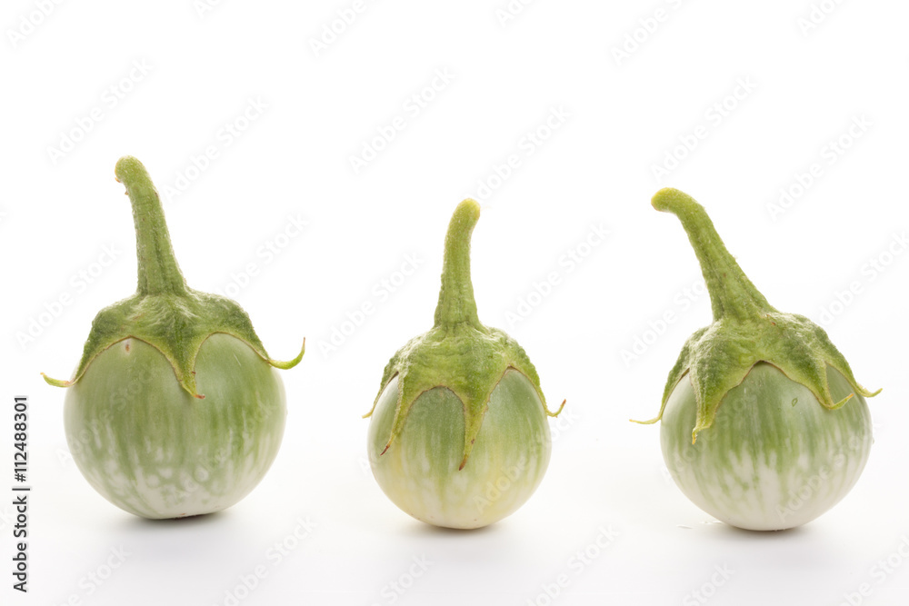 green eggplant with drops of water on White background green eggplant with drops of water on White background