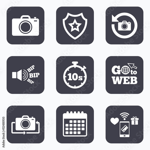 Photo camera icon. Flip turn or refresh signs.