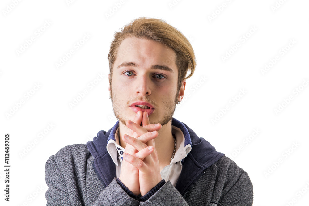 Needy, desperate young man pleading to camera Needy, desperate young man pleading to camera