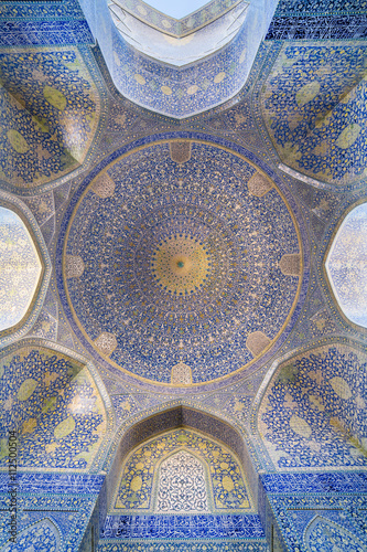 Isfahan, Iran - December 13, 2015: The Shah Mosque  at Naqhsh-e Jahan Square in Isfahan, Iran. Ceiling view.