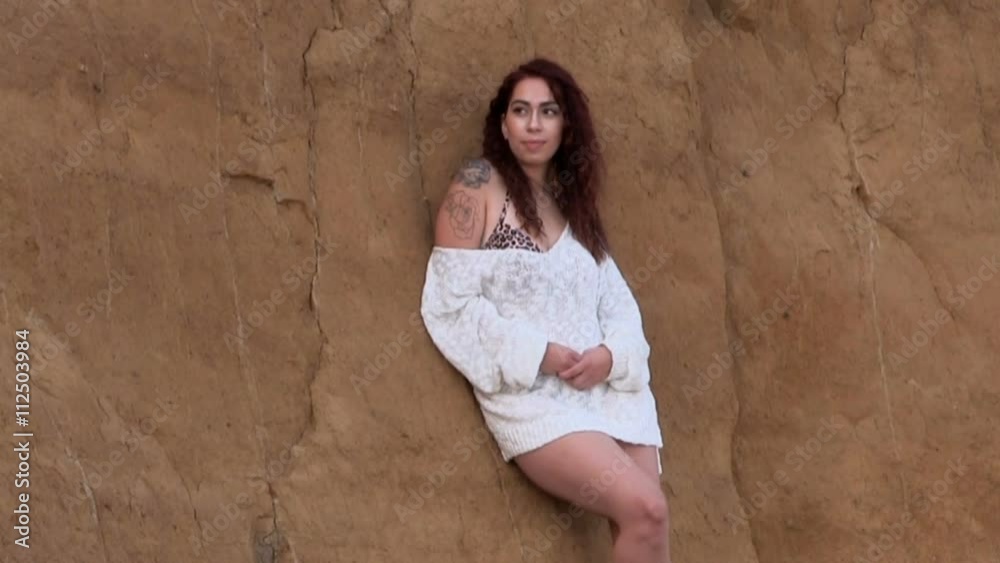Woman Standing In Bikini And Cover Against Cliff Wall Slow Motion
Woman Standing In Bikini And Cover Against Cliff Wall Slow Motion