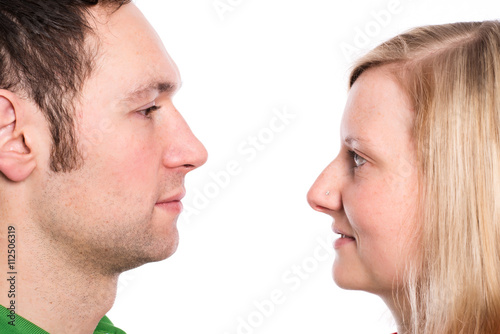 young couple looking in her eyes