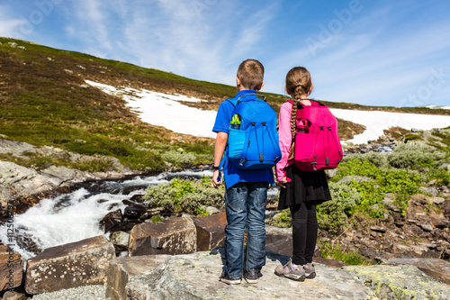 Kids hiking outdoors in nature