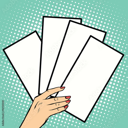Booklets or tickets in hand