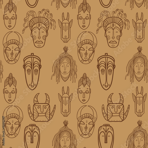 Hand drawn african masks. Seamless vector pattern.