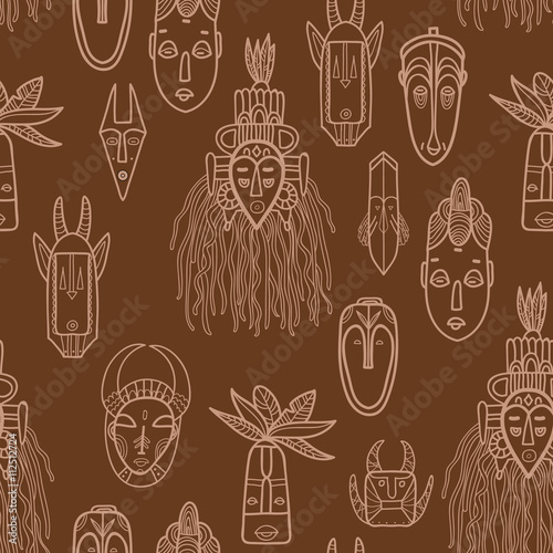 Hand drawn african masks. Seamless vector pattern.