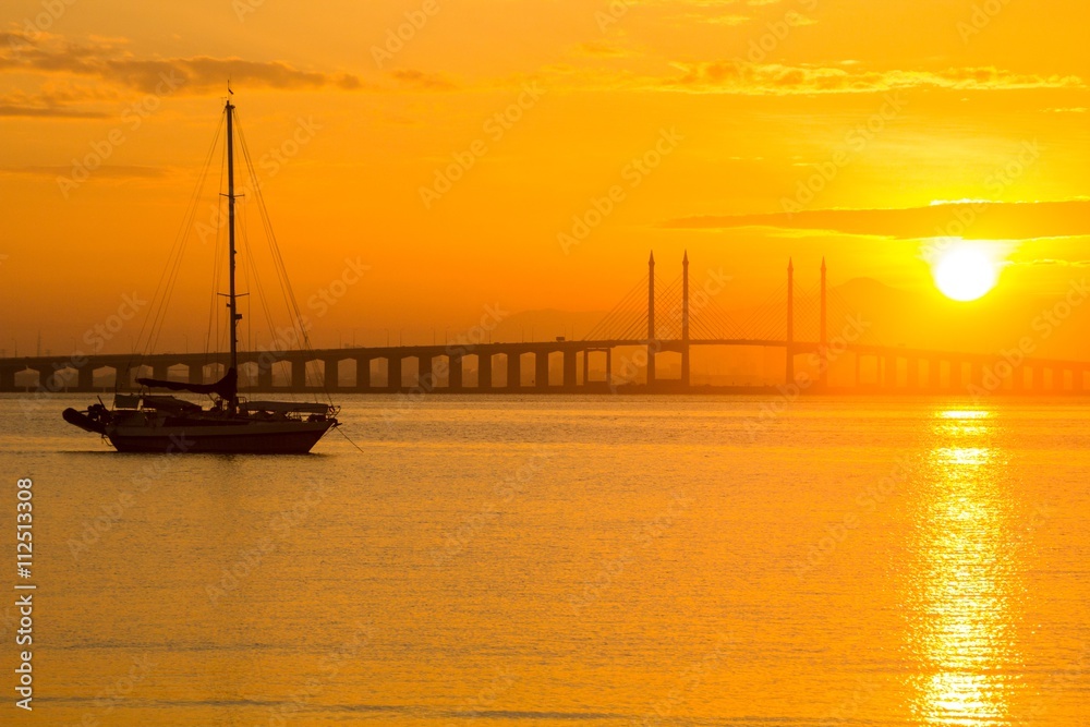 Sunrise in view of Penang Bridge, George Town, Penang Malaysia Sunrise in view of Penang Bridge, George Town, Penang Malaysia