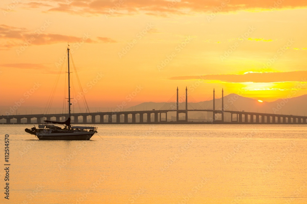 Sunrise in view of Penang Bridge, George Town, Penang Malaysia Sunrise in view of Penang Bridge, George Town, Penang Malaysia
