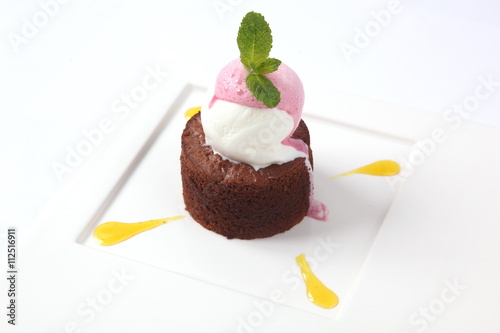 chocolate fondant with sauce and mint