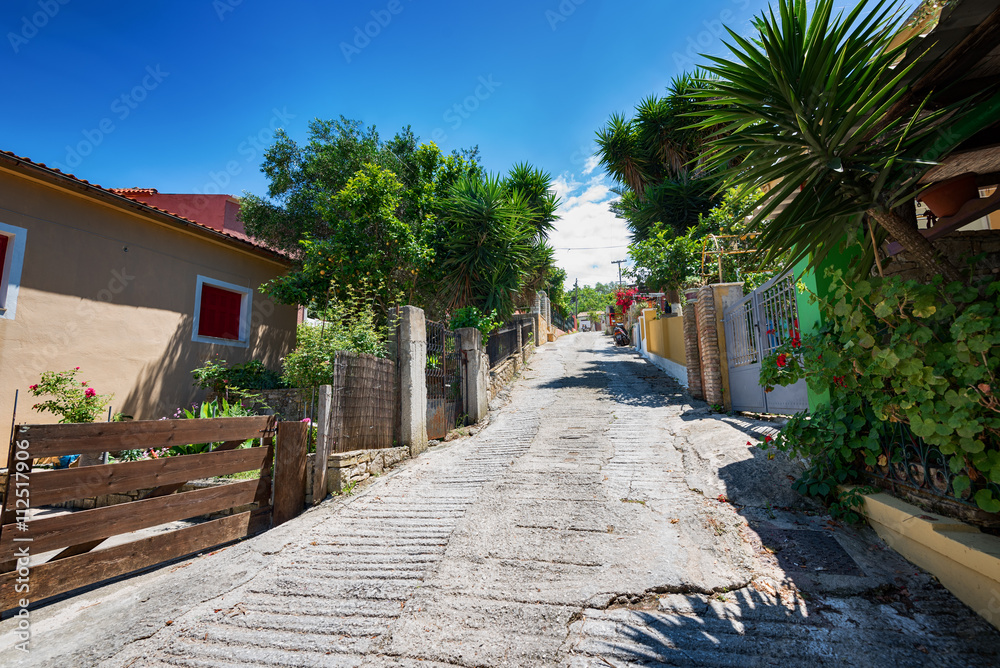 Obraz premium Along the narrow streets of the island of Paxos, Ionian Sea, Greece