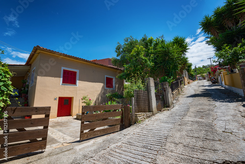 Fototapeta Naklejka Na Ścianę i Meble -  Along the narrow streets of the island of Paxos, Ionian Sea, Greece