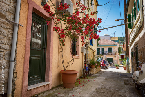 Fototapeta Naklejka Na Ścianę i Meble -  Along the narrow streets of the island of Paxos, Ionian Sea, Greece