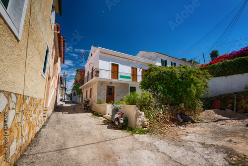 Fototapeta Naklejka Na Ścianę i Meble -  Along the narrow streets of the island of Paxos, Ionian Sea, Greece
