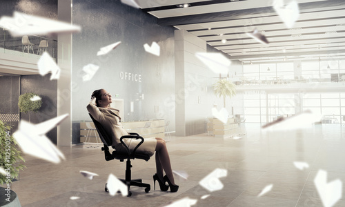 Businesswoman having rest in office