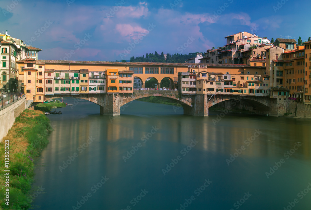 A view of the Old Bridge Ponte Vecchio over Arno river in Florence, Italy