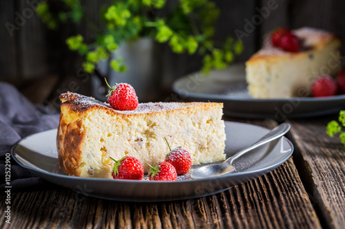 Homemade cheesecake with fruits and sugar
