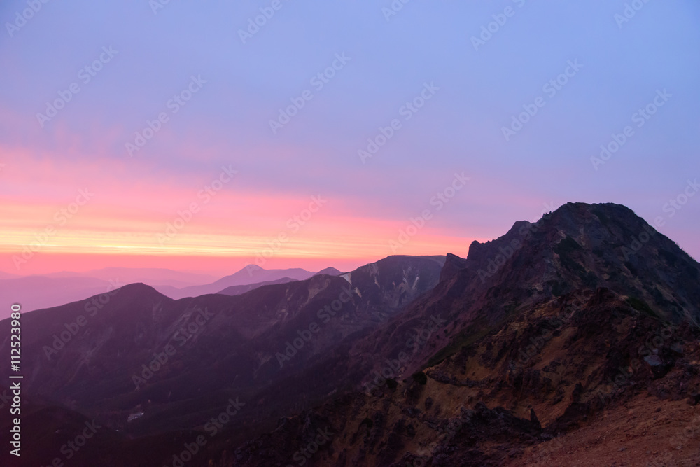 Sunset view on the Yatsugatake mountains in Nagano, Japan Sunset view on the Yatsugatake mountains in Nagano, Japan