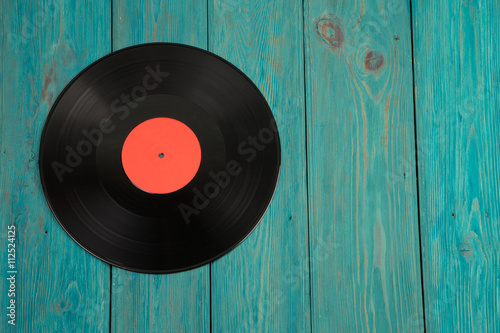 vintage lp record on the  wooden desk