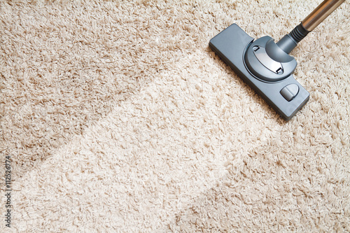 include the long beige carpet cleaning with a vacuum cleaner